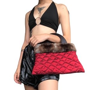 Red bag with faux fur and wood handle
